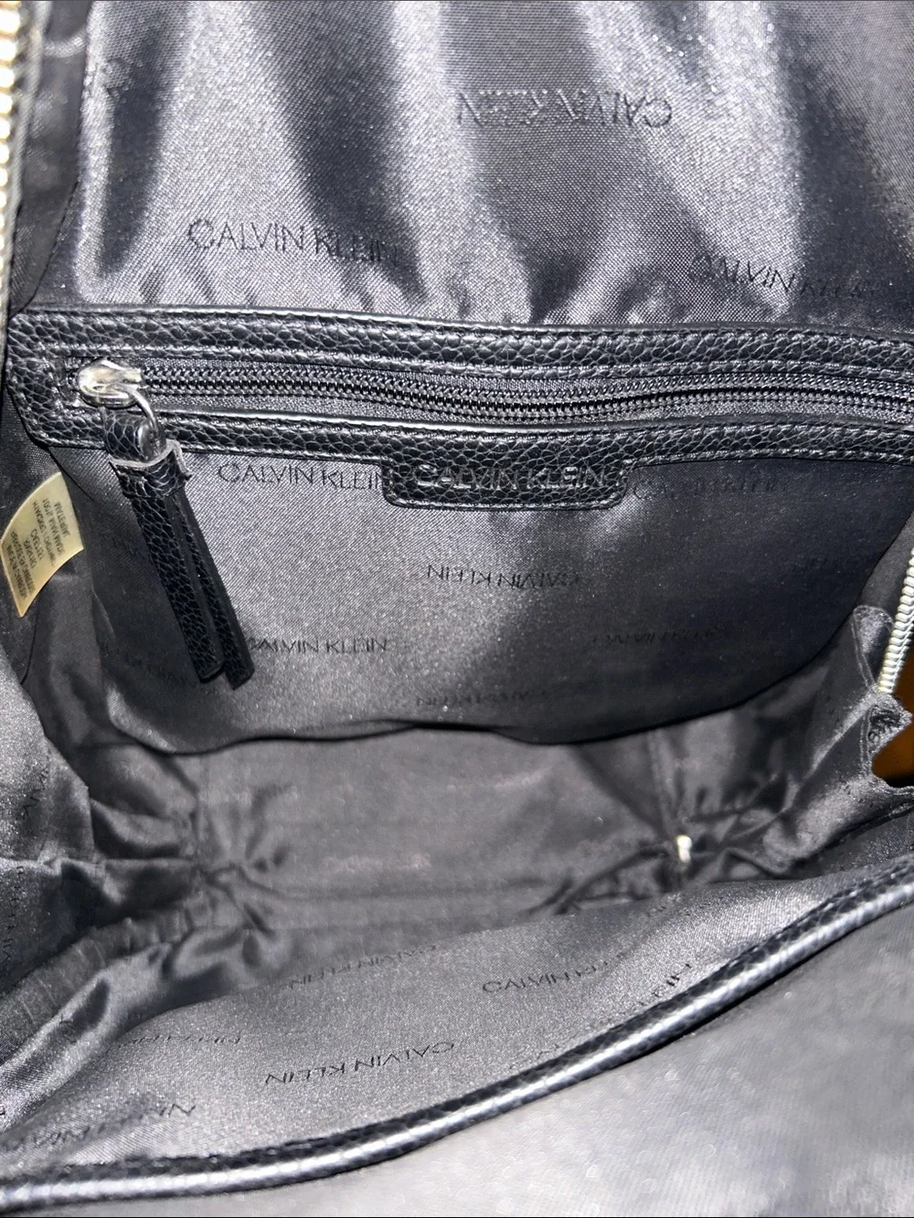 Calvin Klein Black Pebbled Leather Mini Backpack with Front Zip Pocket
